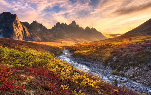 A river runs through the mountains.